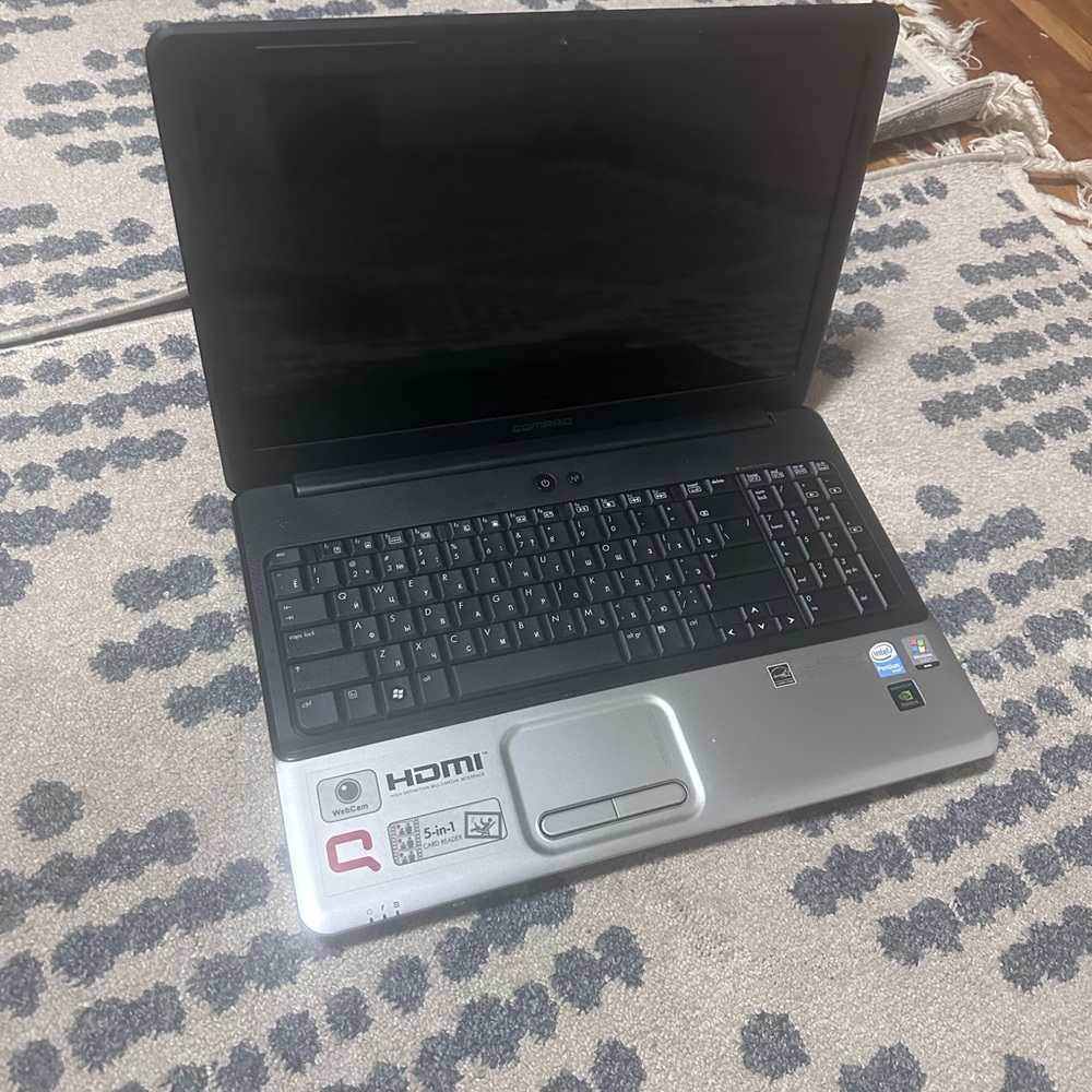 Black and Silver Laptop with Full-Size Keyboard and Numeric Keypad